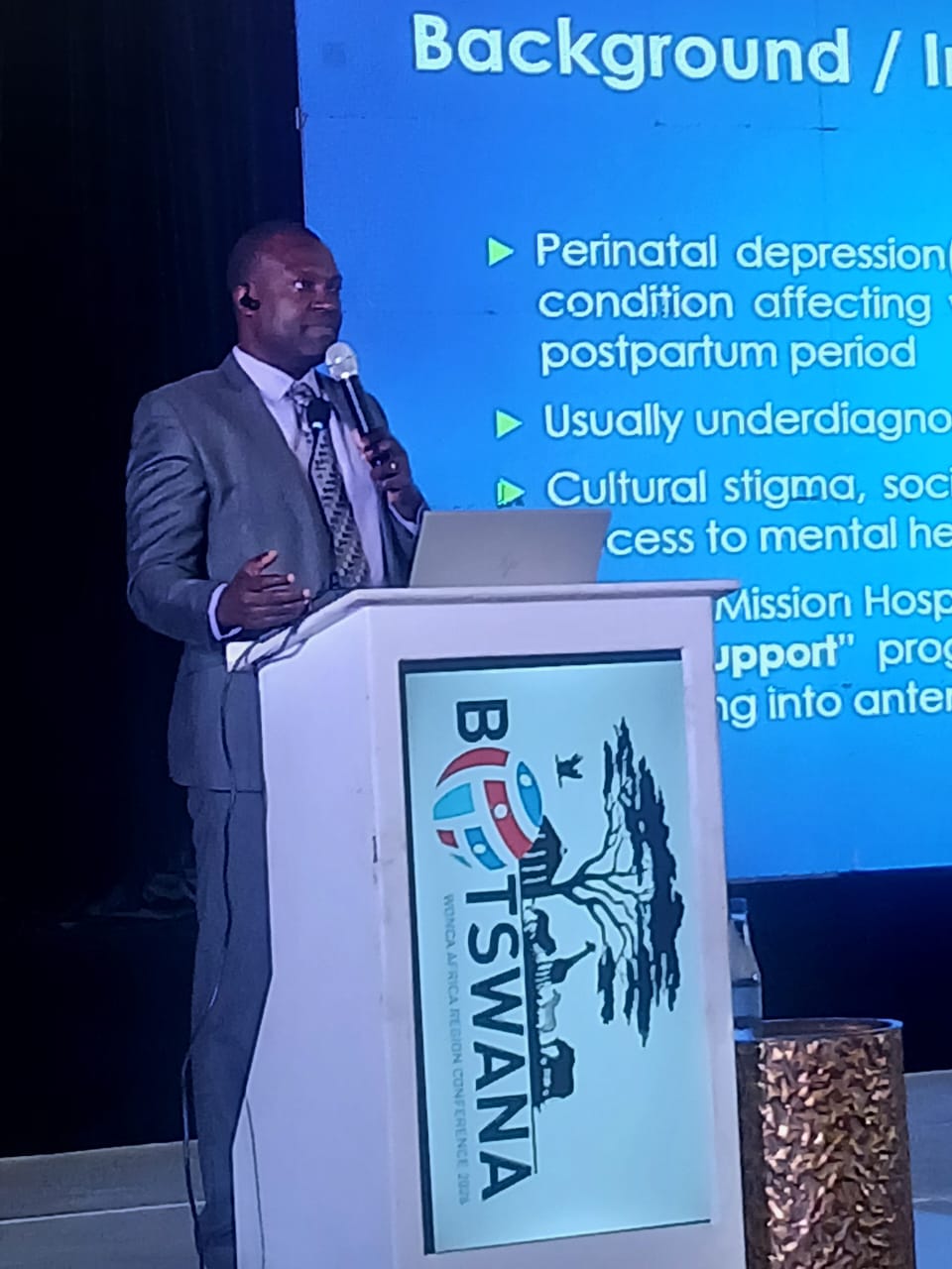 Dr. Stephen Engmann presenting Abstract 49 at the podium